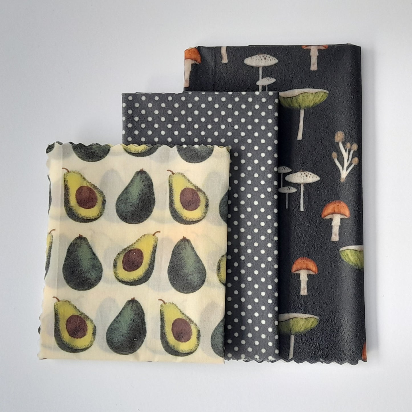 beeswax wrap, front side, avocado print, mushroom print, cotton fabric